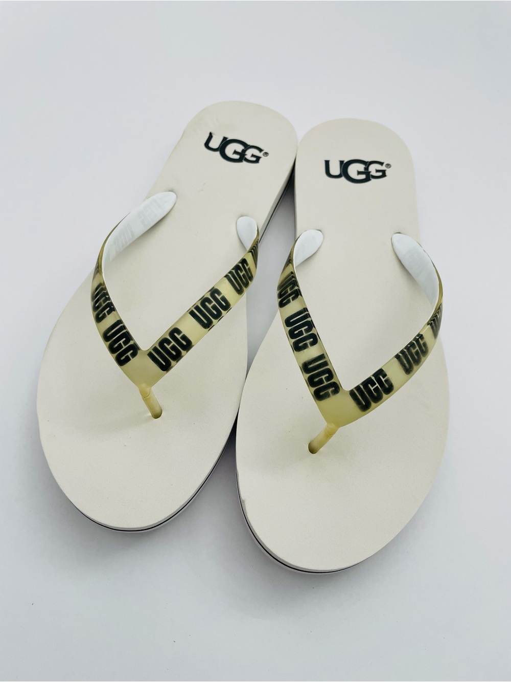 UGG white Flip Flop Sandals with Black Logo Straps